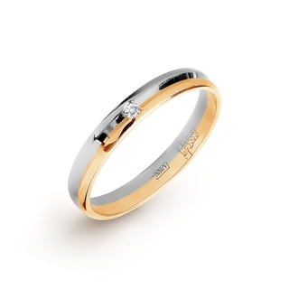 Кольцо обрцчальное из комбинированного золота с фианитом